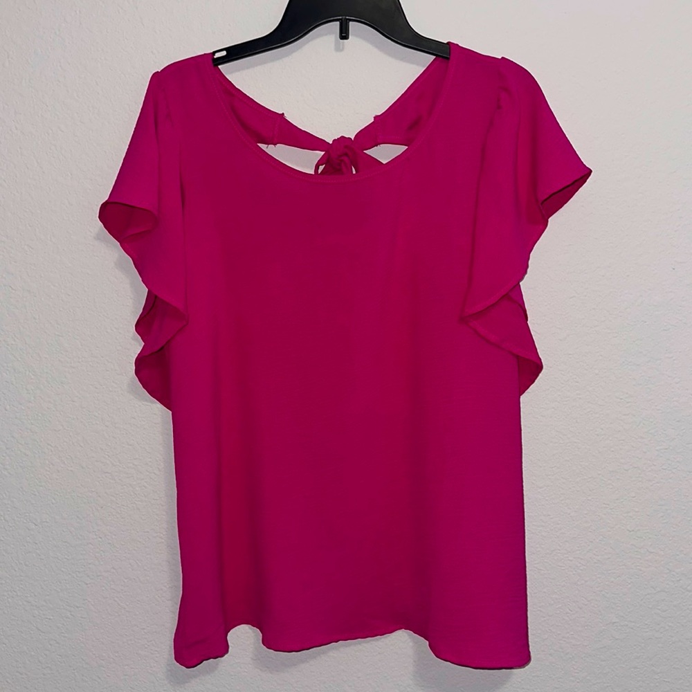 Ruffle sleeve top.